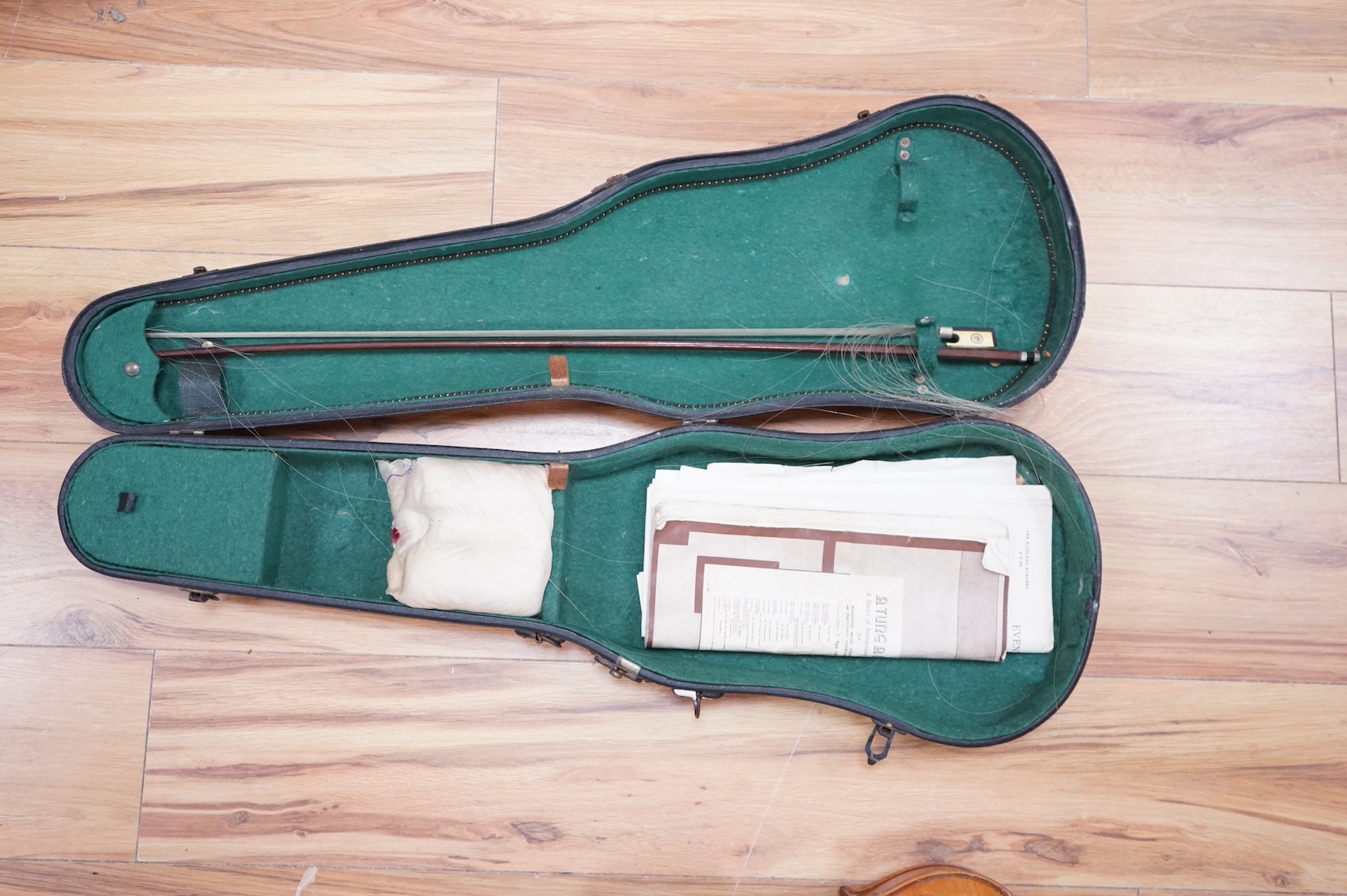 A cased full length violin, circa 1900, with bow, bears Stradivarius label to the interior. CITES Submission reference WVME8714